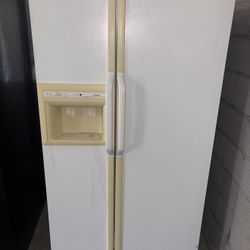White GE Refrigerator And Freezer