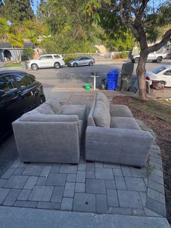Couch, table, paintings ready for pickup
