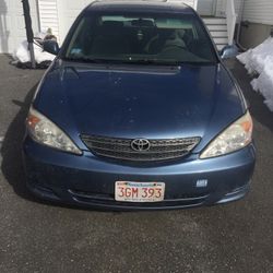 Blue Toyota Camry LE 4 Cylinder