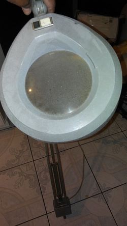 Desk lamp with magnifier glass