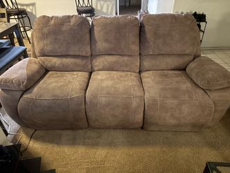 Couch with electric recline seats