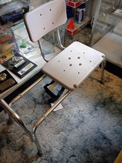 Sliding shower chair