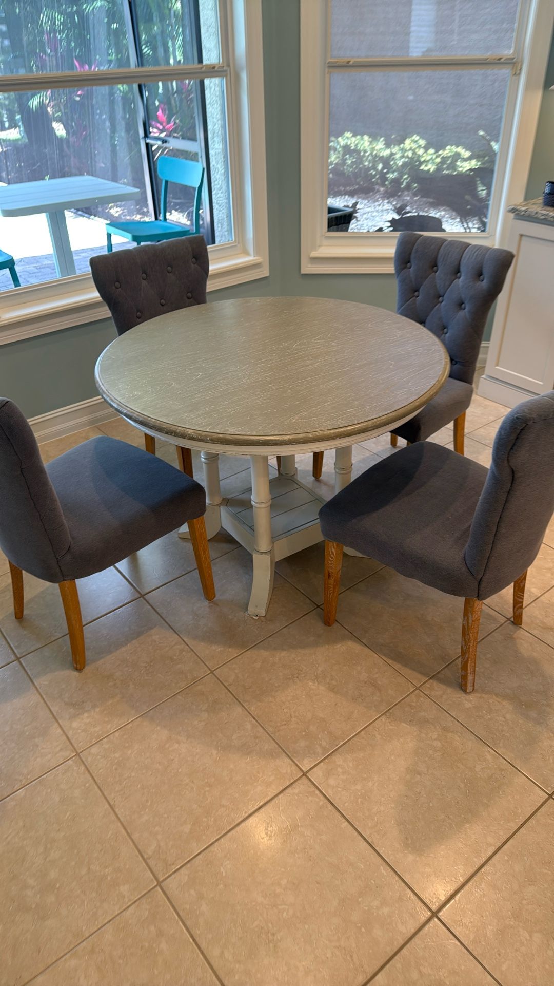 42 Inch round Wooden Table With 4 Cloth Chairs