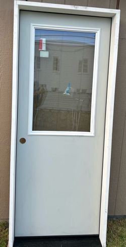 Puerta /door para exterior  con marco  $350 dlls new /nueva  32x80  nueva