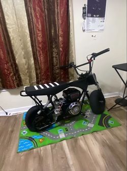 Brand new bulit mini bike (preferably would want to trade this with a e moto or a rid star but money is good to