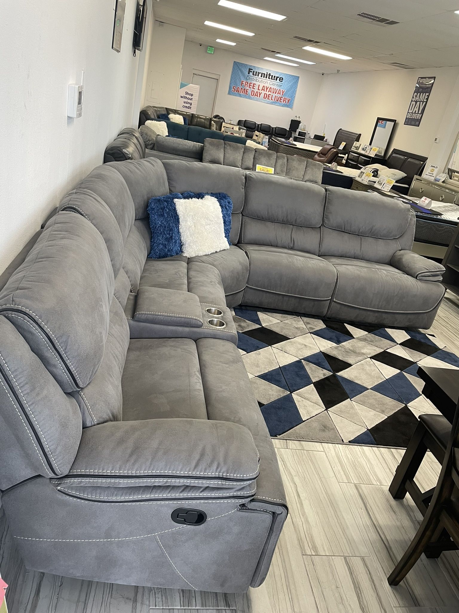 Holiday sale. Alejandra gray reclining sectional only $1799. Easy finance option. Same day delivery.