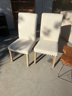 White linen dining room chairs