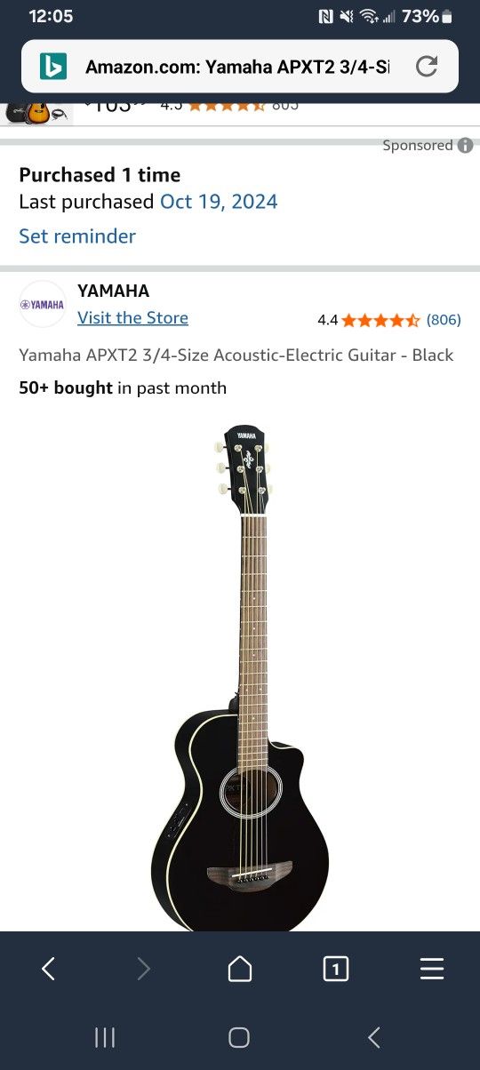 Yamaha Guitar with Stand and Chords book.