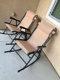 2 outdoor rocking chairs