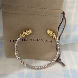 David Yurman 925 sterling silver twisted rope cuff bracelet with gold-encrusted diamond ends 