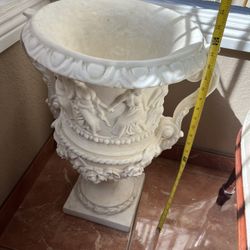 Very nice decorative plant/flower planter. 2 feet tall.