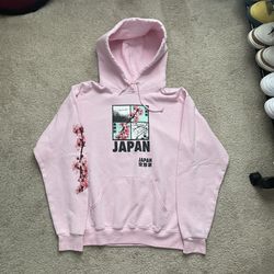 pink hoodie with japan graphic