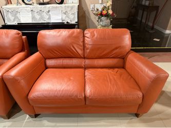 Orange sofas. 2 seater . 1 seater . And 1 recliner