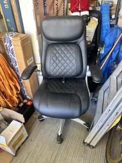 Leather office chair with armrests