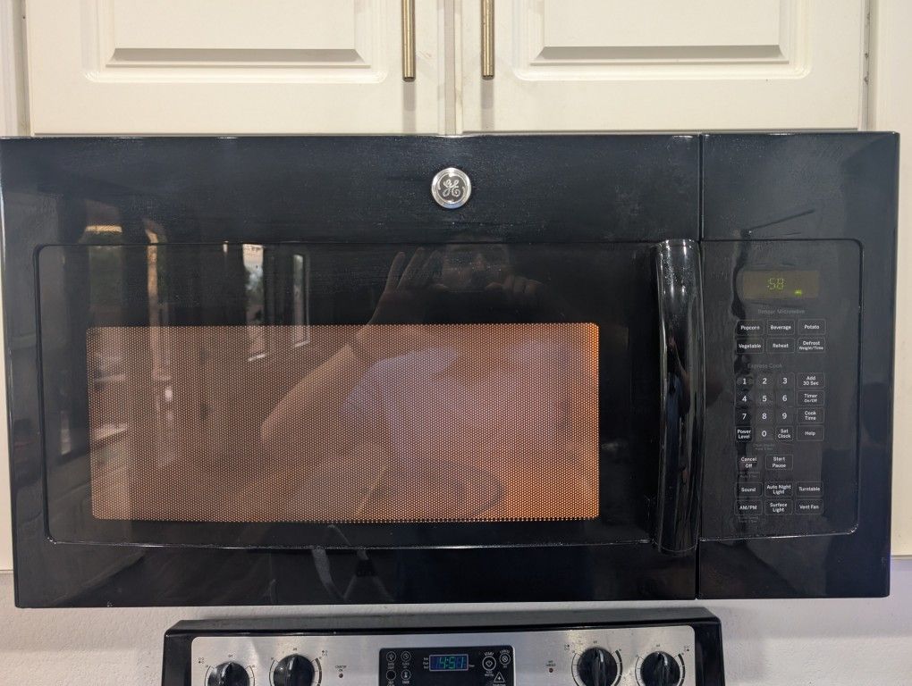GE Black Microwave Over The Range With Bracket