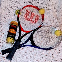 Four Tennis Racquets and Balls