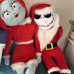 This is a set of giant Disney "The Nightmare Before Christmas" plush toys featuring Jack Skellington in a Santa costume and Sally. The set includes tw