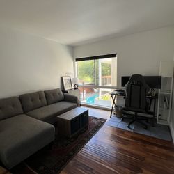 Sectional With Pull-Out Day Bed And Left Sided Chaise