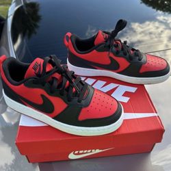 red and black low nikes