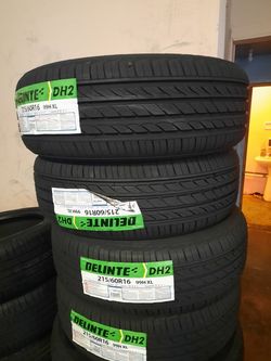 Set of 4 brand new tires 215/60/16