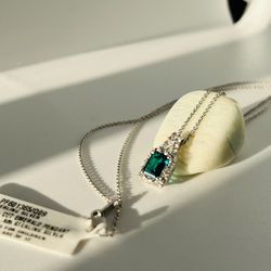 Sterling silver necklace chain 18”with lab created Emerald pendants 3 grams