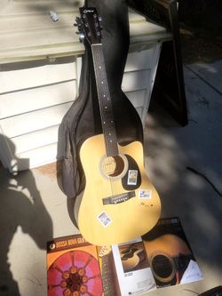 Jinyin Acoustic Cutaway Guitar with Soft Bqckpack style Case
