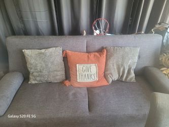 sofa bed and 2 bar stool