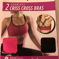 Champion Set of 2 SEAMLESS CRISS CROSS Sports BRAS Pink And Black Size L  for Sale in Bonita, CA - OfferUp