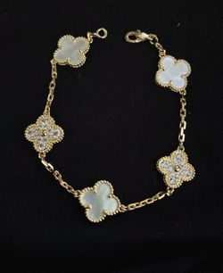 Beautiful gold and mother pearl flower bracelet $60