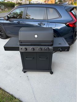 Barbecue grill comes with cover brand new never used Barbecue grill comes with cover brand new never used