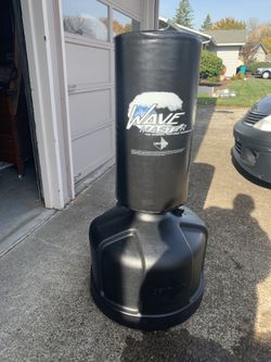 Wave master punching bag and kicking bag in brand new condition retails for $150