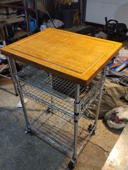 Kitchen cart with cutting board