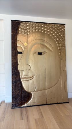 Carved wood panel Buddha