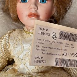 Porcelain Doll With Angelic Outfit