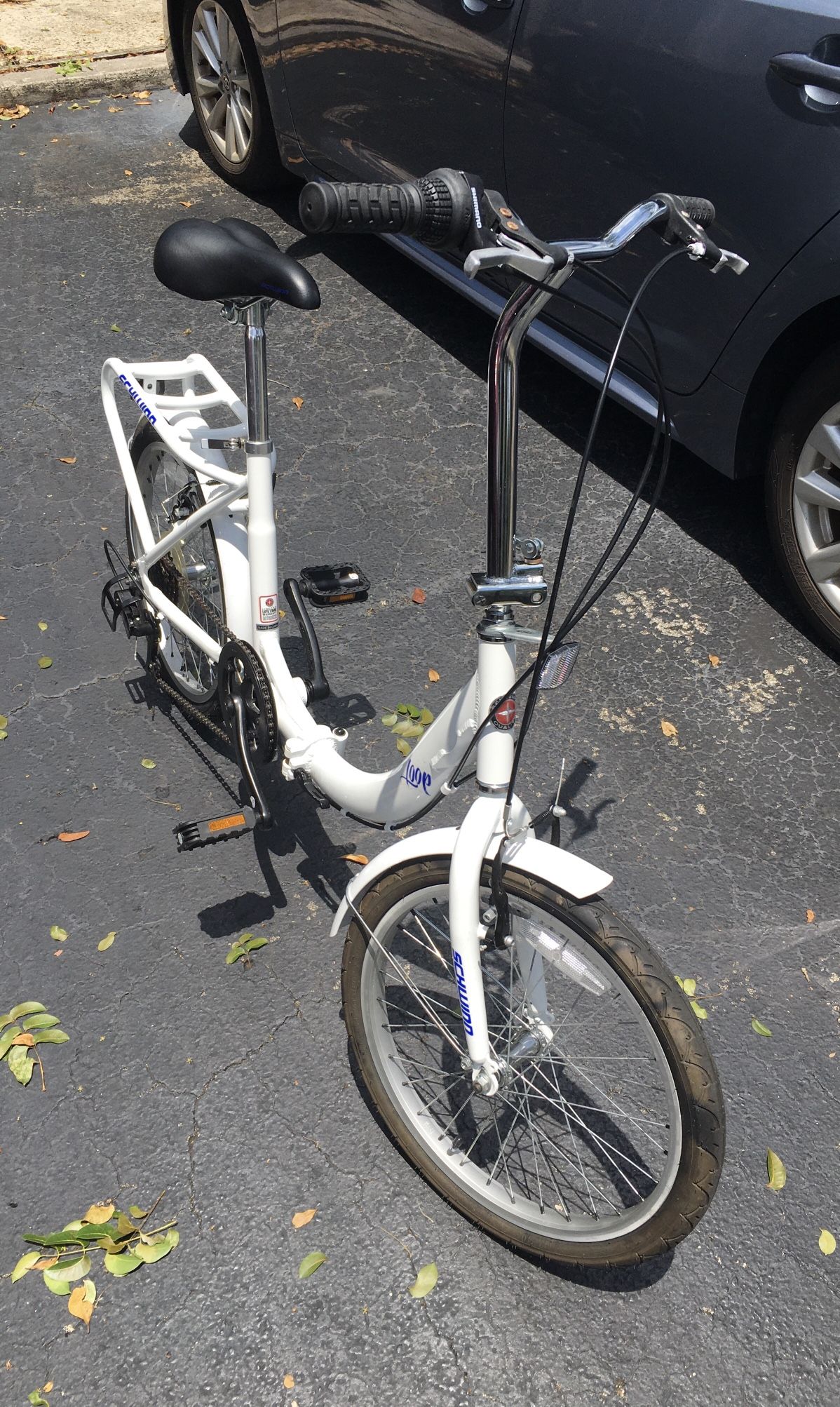 New Schwinn Loop Adult Folding Bike. (Never used) TRADE??? The bike has a folding steel frame for easy storage and transport. Lightweight step-through
