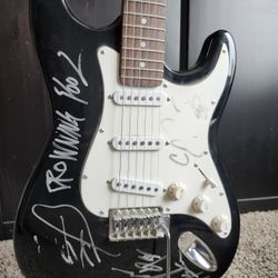 Autograph guitars by Drowning Pool