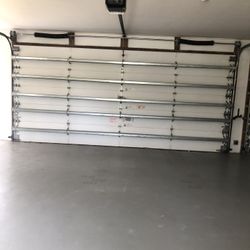 Garage Door Broken Spring Opener Off Track Adjustment Replace and Parts 