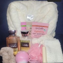 New $45 firm Can choose between ivory and gray Includes: One size fits most bathrobe, 3 face masks, fuzzy socks, Bath and body works body wash 10oz , 