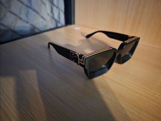 Louis Vuitton sunglasses.