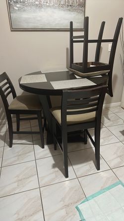 Small high brown dining table