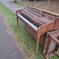 Whitney Piano.  Out of tune and damaged.  2830 EatonAveLakelandFlorida.