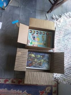 2 Boxes Of Comic Books