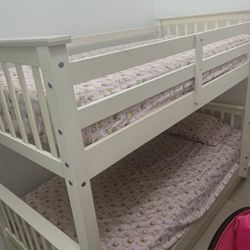 used white bunk bed with mattress