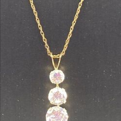 10k gold graduating cubic zirconia pendant necklace