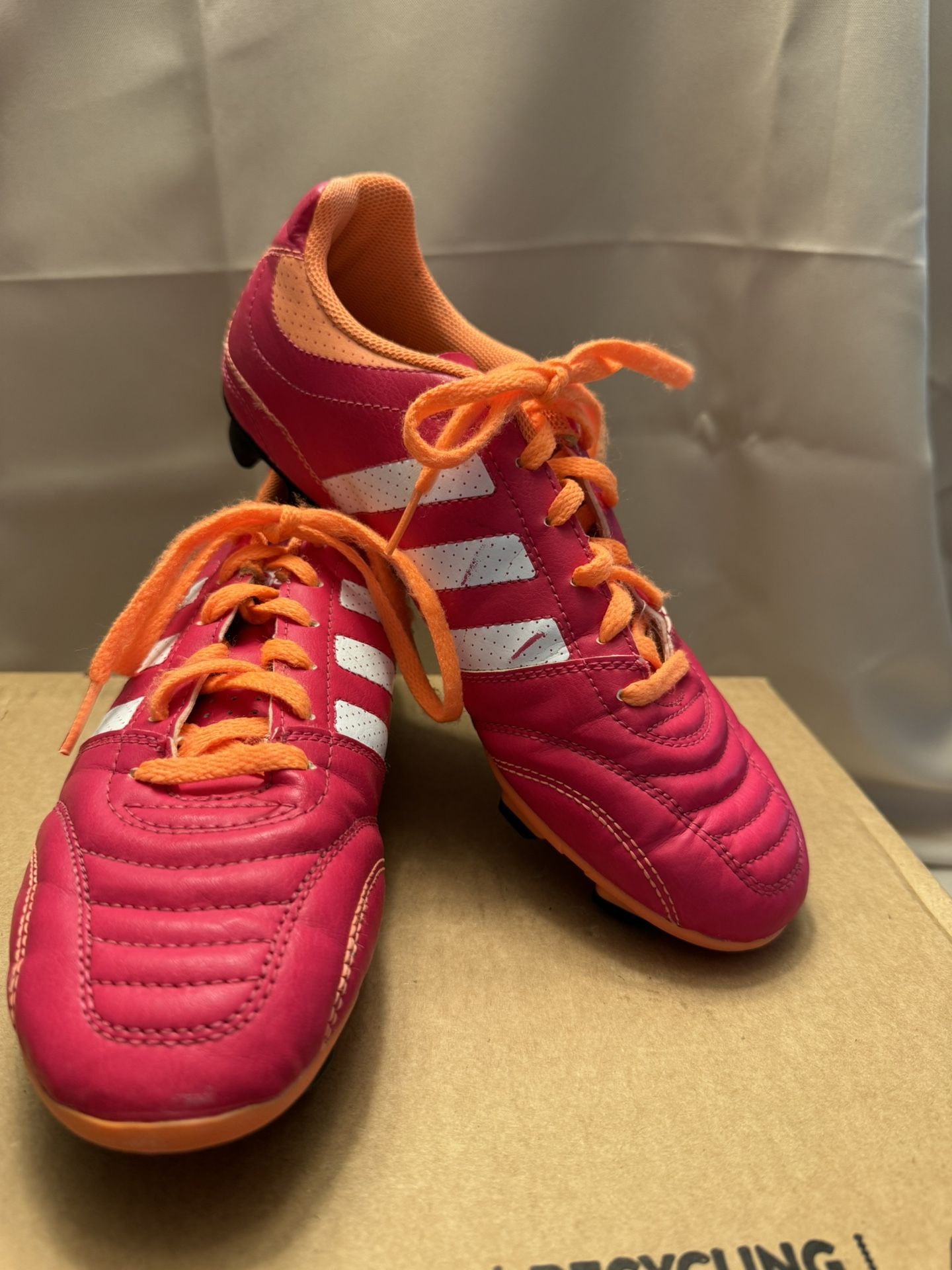  vibrant neon soccer shoes by Adidas 7.5