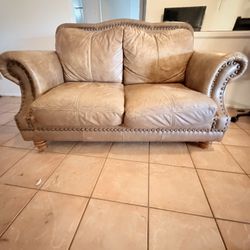 tan nailhead leather  love seat
