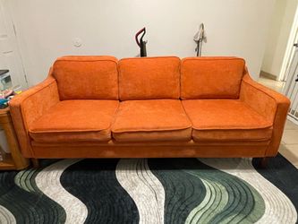 Orange sofa with protection plan (pick up only)
