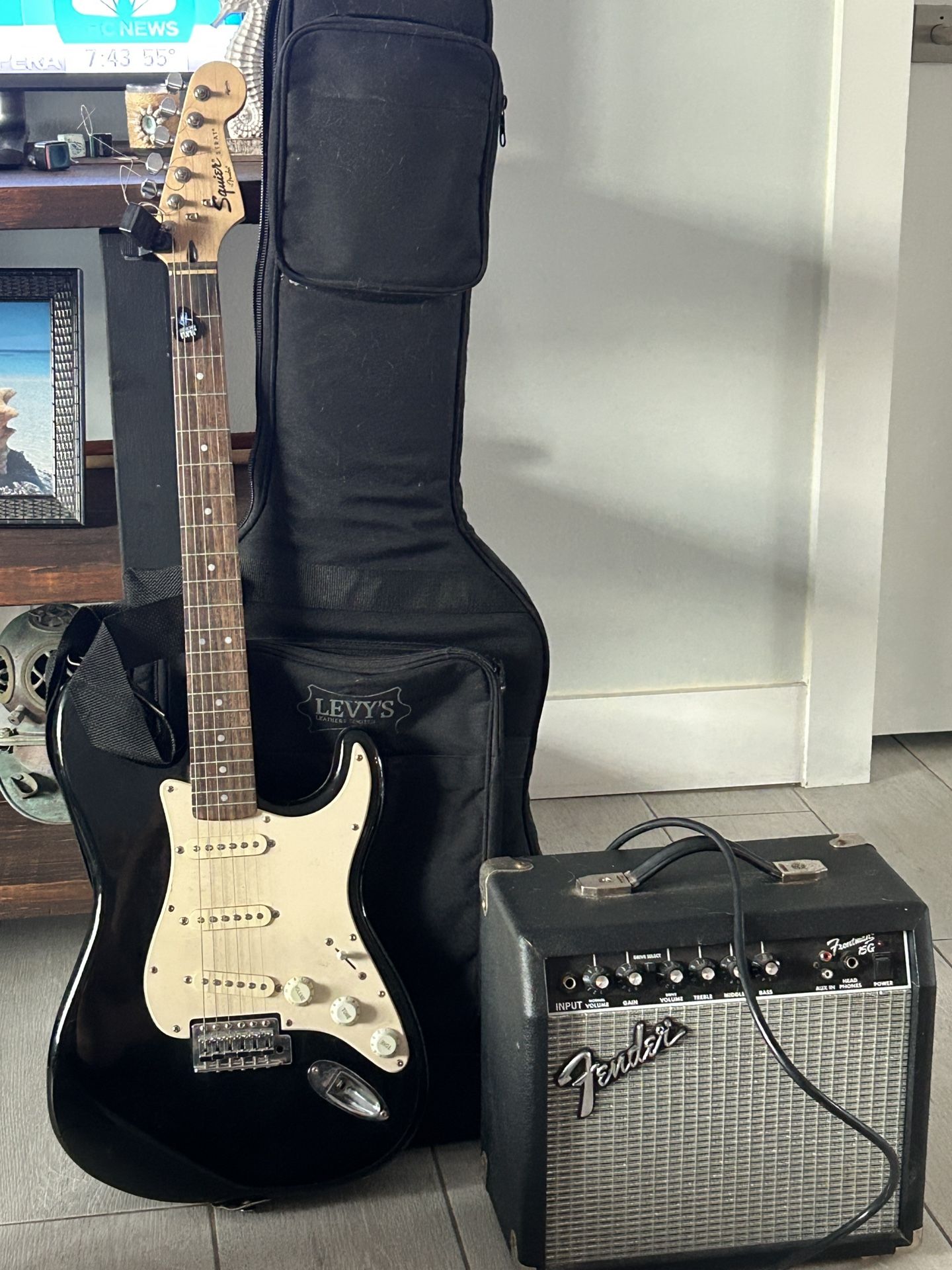 Squire electric guitar with fender amp