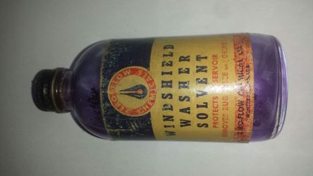 Antique windshield washer solvent bottle