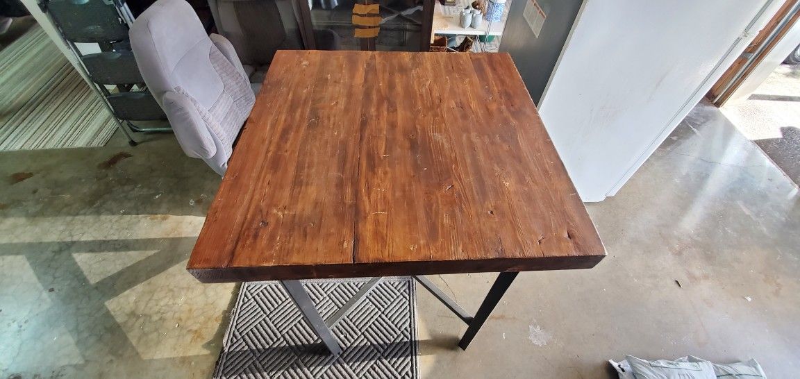 Wooden table (no chairs available)